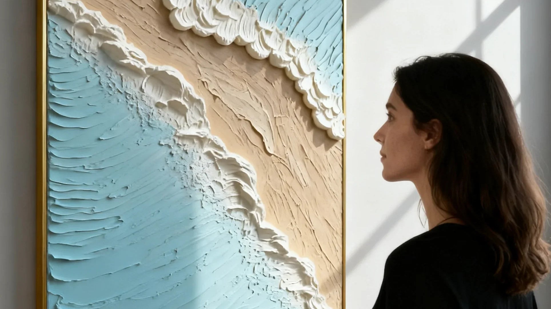 The contrast between a monochrome wall and a space with a hand-painted oil painting
