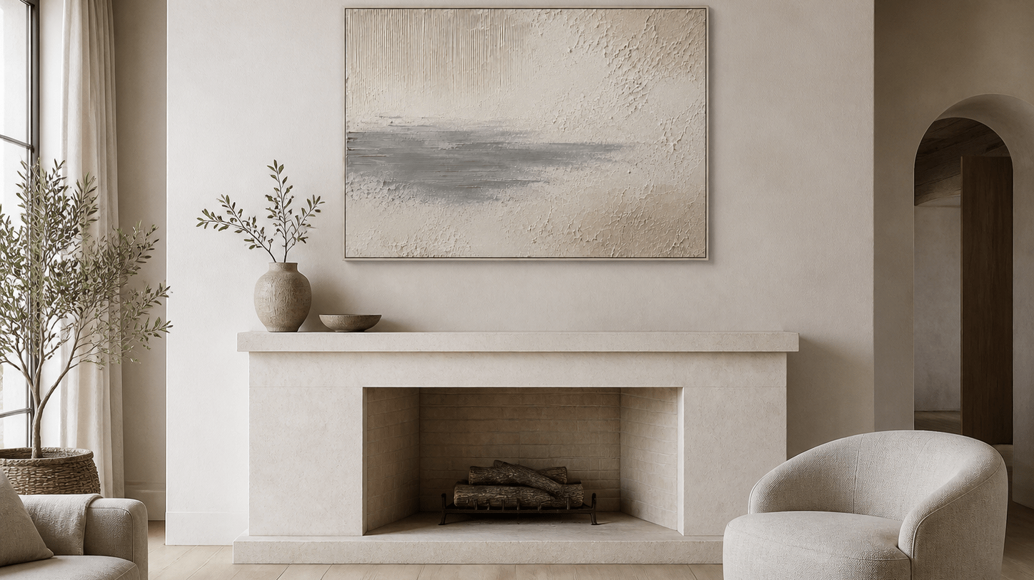 Soft Grey Horizon hand-painted textured wall art above a pale stone fireplace in a neutral living room
