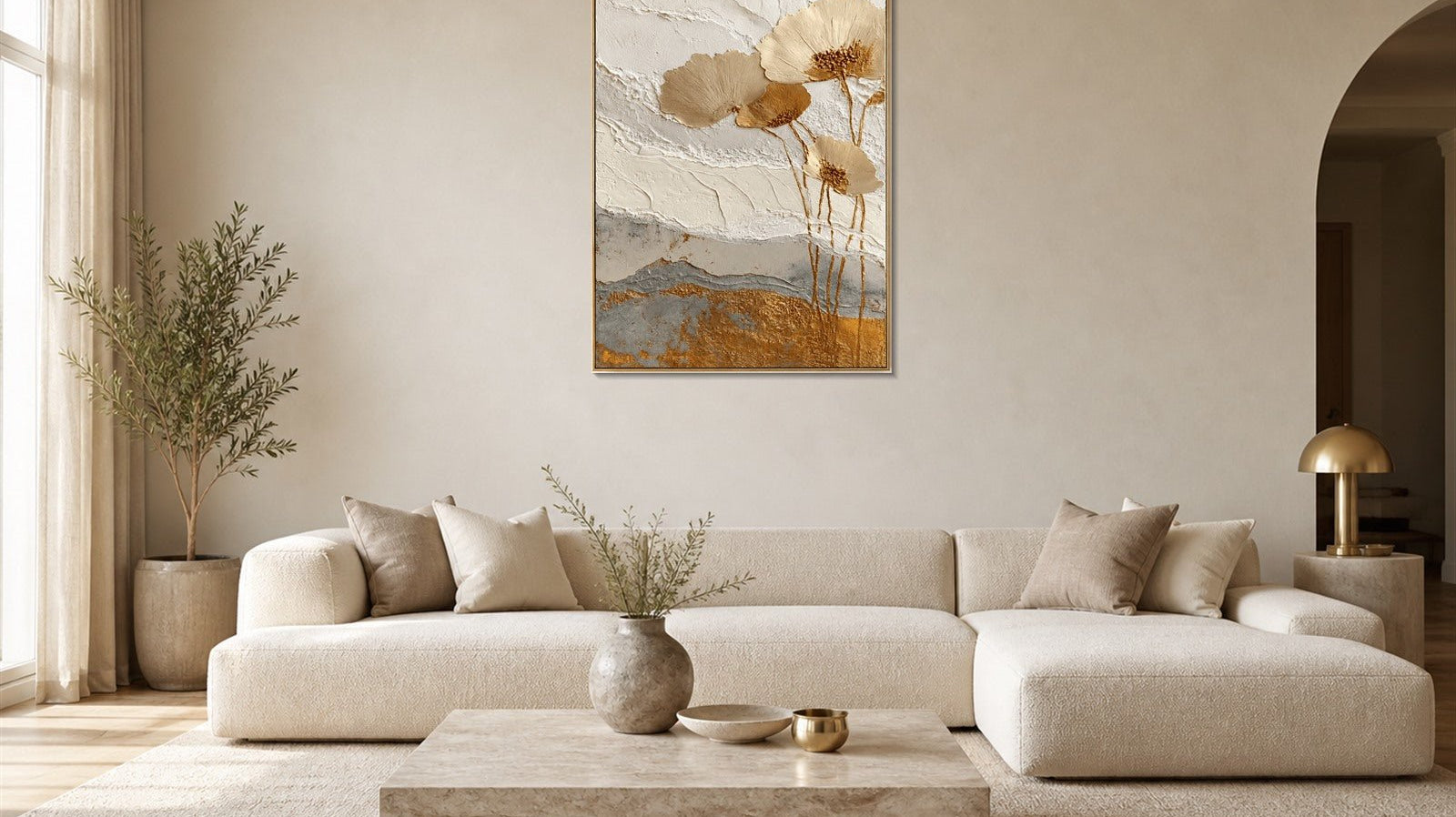 3D textured floral wall art with champagne gold flowers above a cream sofa in a quiet luxury living room
