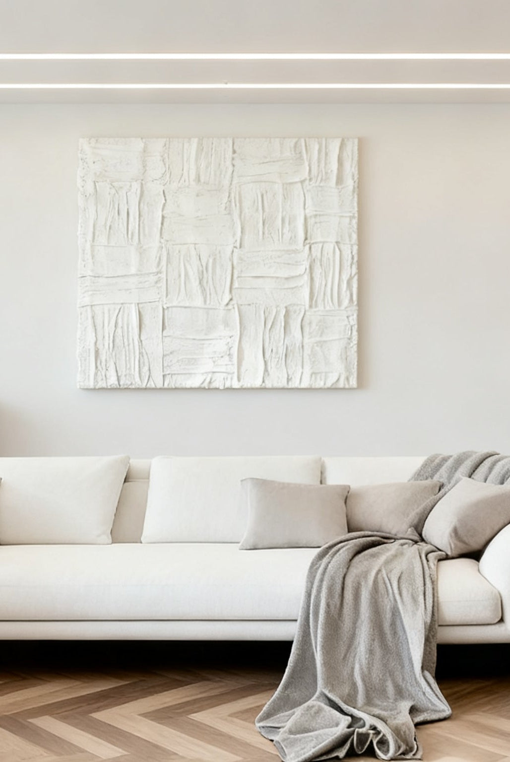 Textured wall art with mixed materials - adding a tactile feel to living room decor