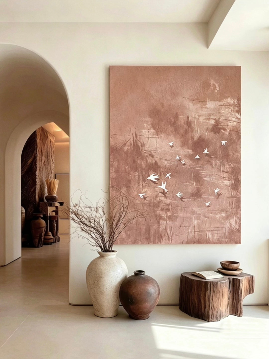 Hand-painted abstract bird wall art featuring white birds in flight over a textured blush pink and taupe background, contemporary canvas artwork for modern living room and bedroom decor.