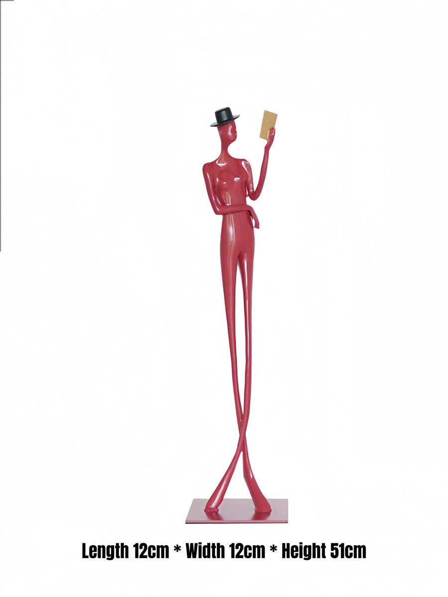 abstract male figure reading a gold book, 51cm tall matte red metal sculpture for home office shelf decor