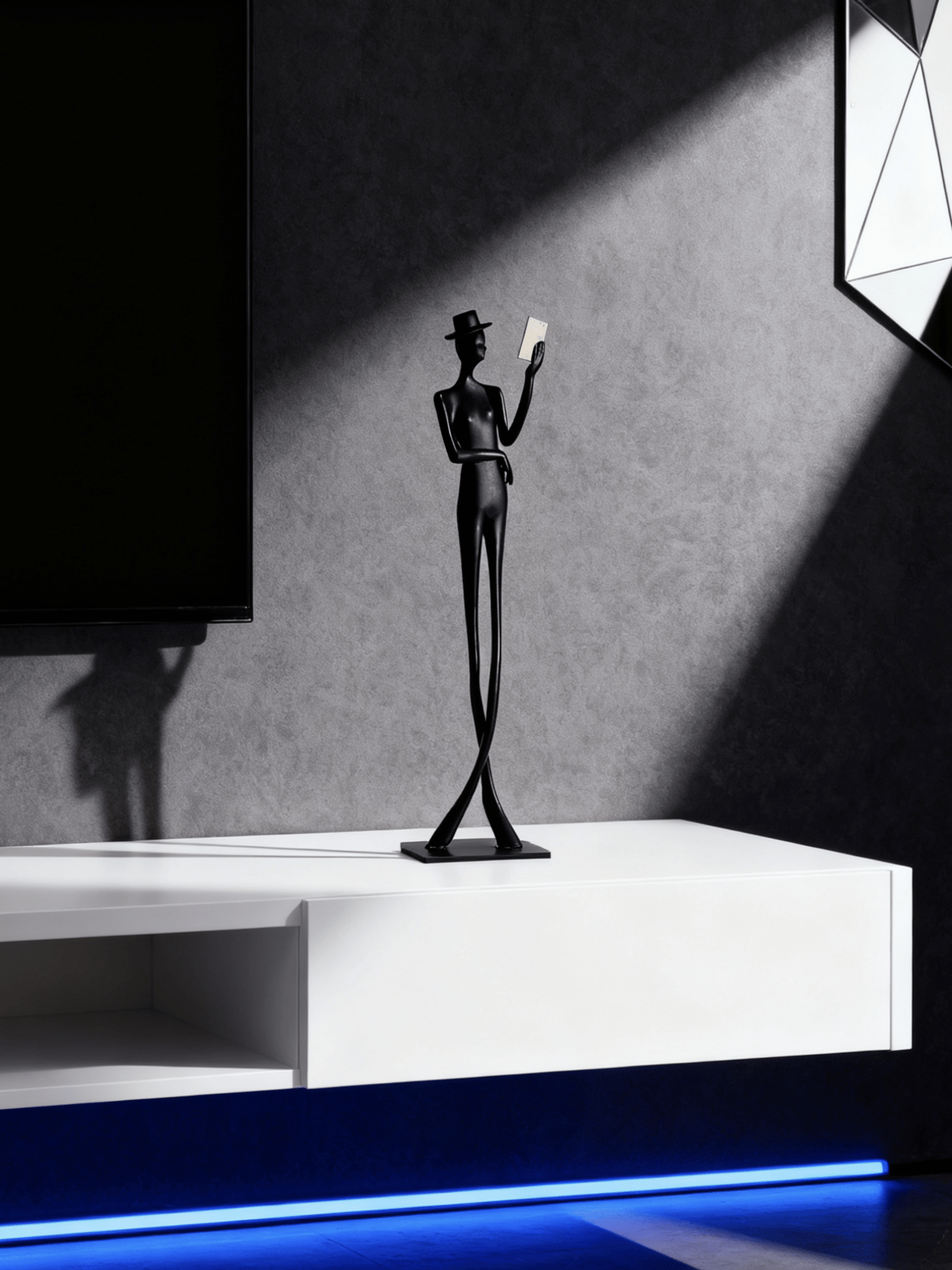 abstract male figure reading a gold book, 51cm tall matte black metal sculpture for home office shelf decor