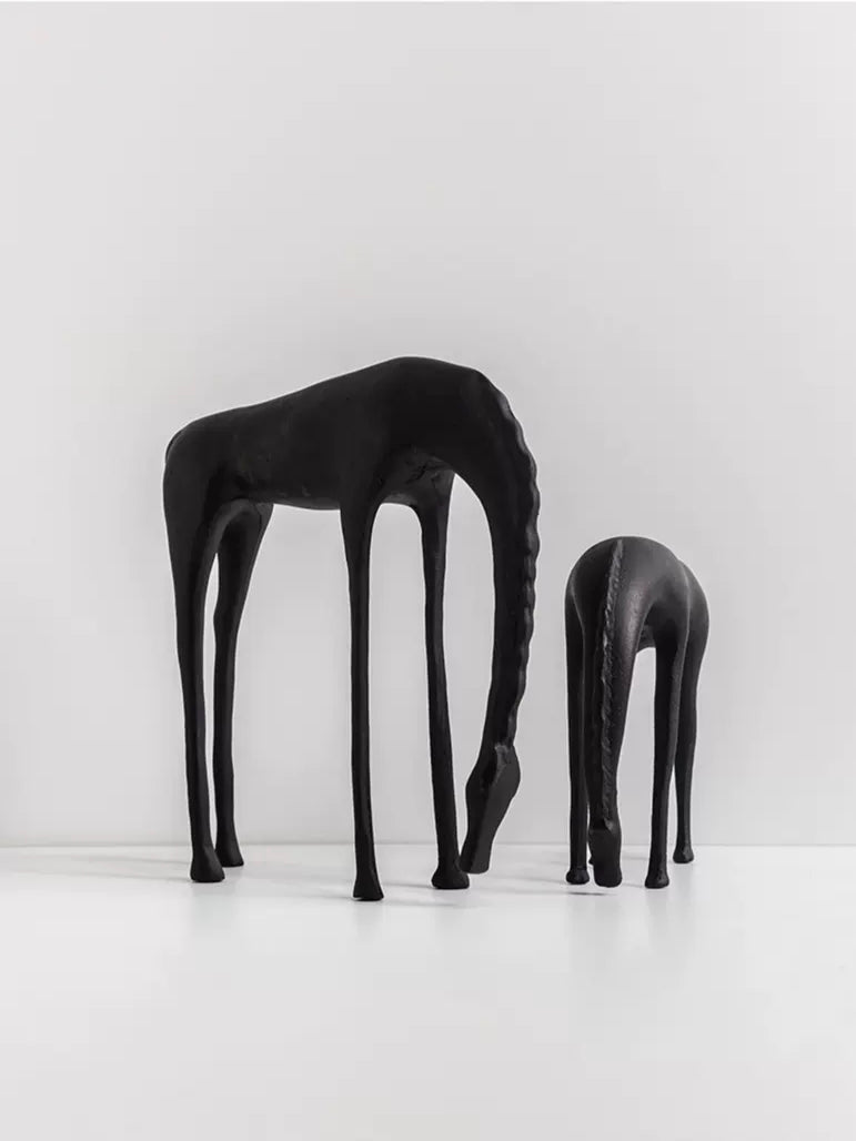 Modern minimalist drinking horse sculpture in matte black metal– elegant home decor for shelf, console, or desk styling
