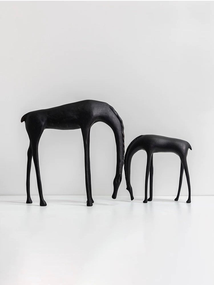 Modern minimalist drinking horse sculpture in matte black metal– elegant home decor for shelf, console, or desk styling