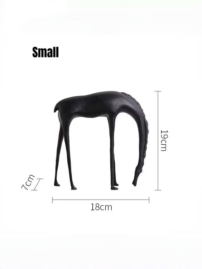 minimalist matte black metal horse sculpture standing on black decorative books, modern Nordic shelf decor