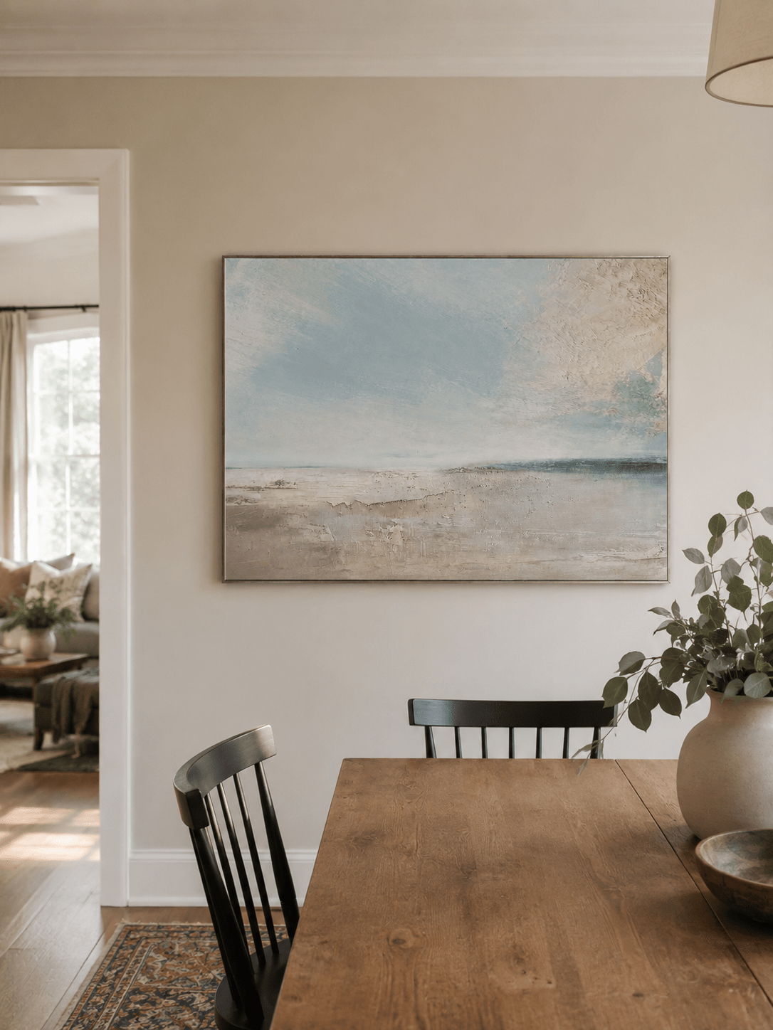 Textured abstract ocean painting in ivory, beige, and soft blue