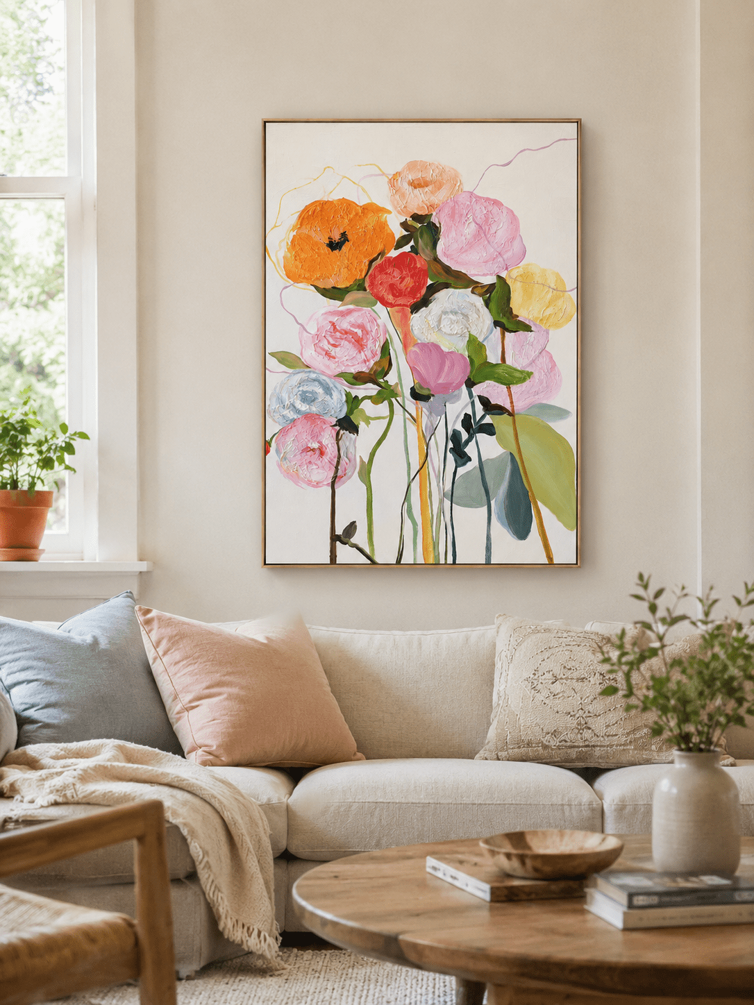 Colorful textured floral wall art displayed above a neutral sofa in a contemporary living room