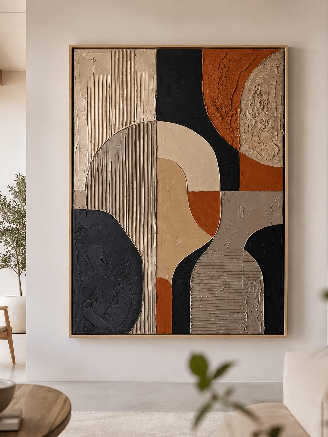 Modern abstract relief painting with geometric shapes and multiple textures in beige, black, terracotta, and grey colors.