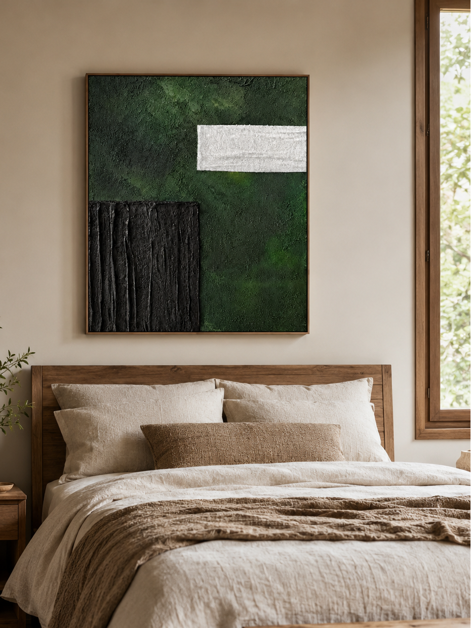Deep green geometric abstract wall art displayed above the bed in a contemporary neutral bedroom