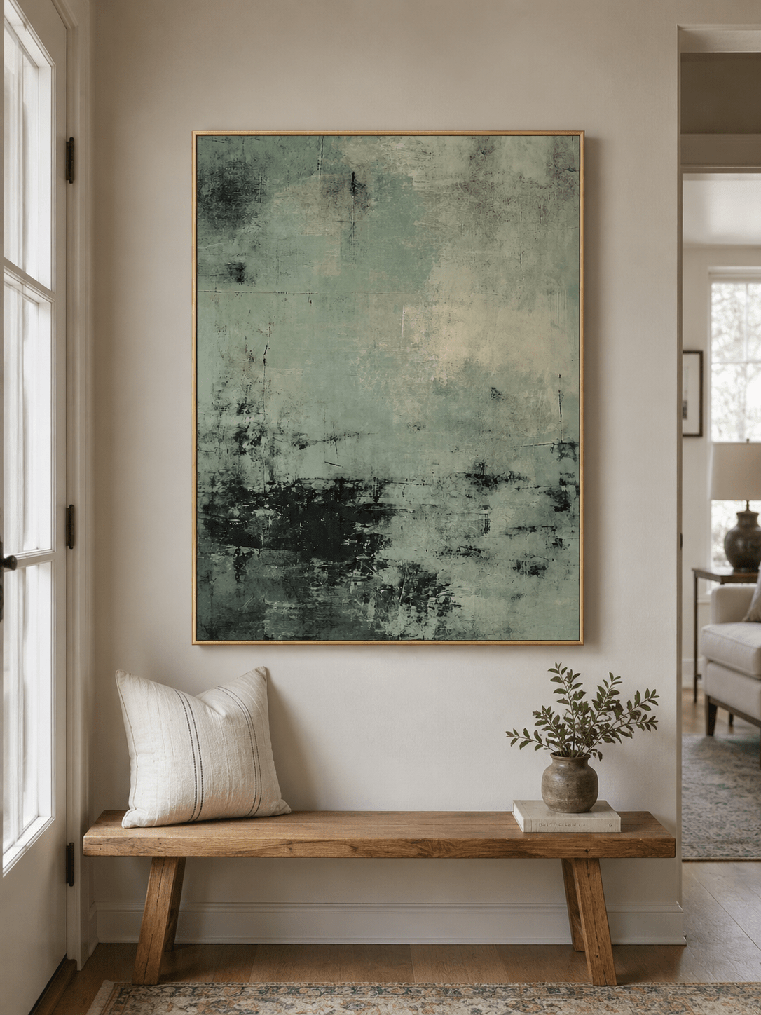 Modern sage green abstract wall art displayed above a console table in an entryway