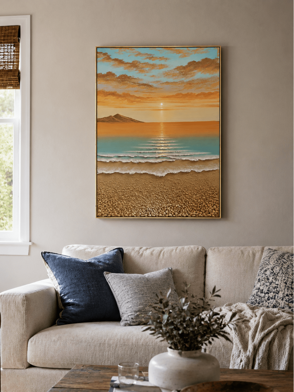 Textured coastal sunrise wall art above a neutral sofa in a modern coastal living room