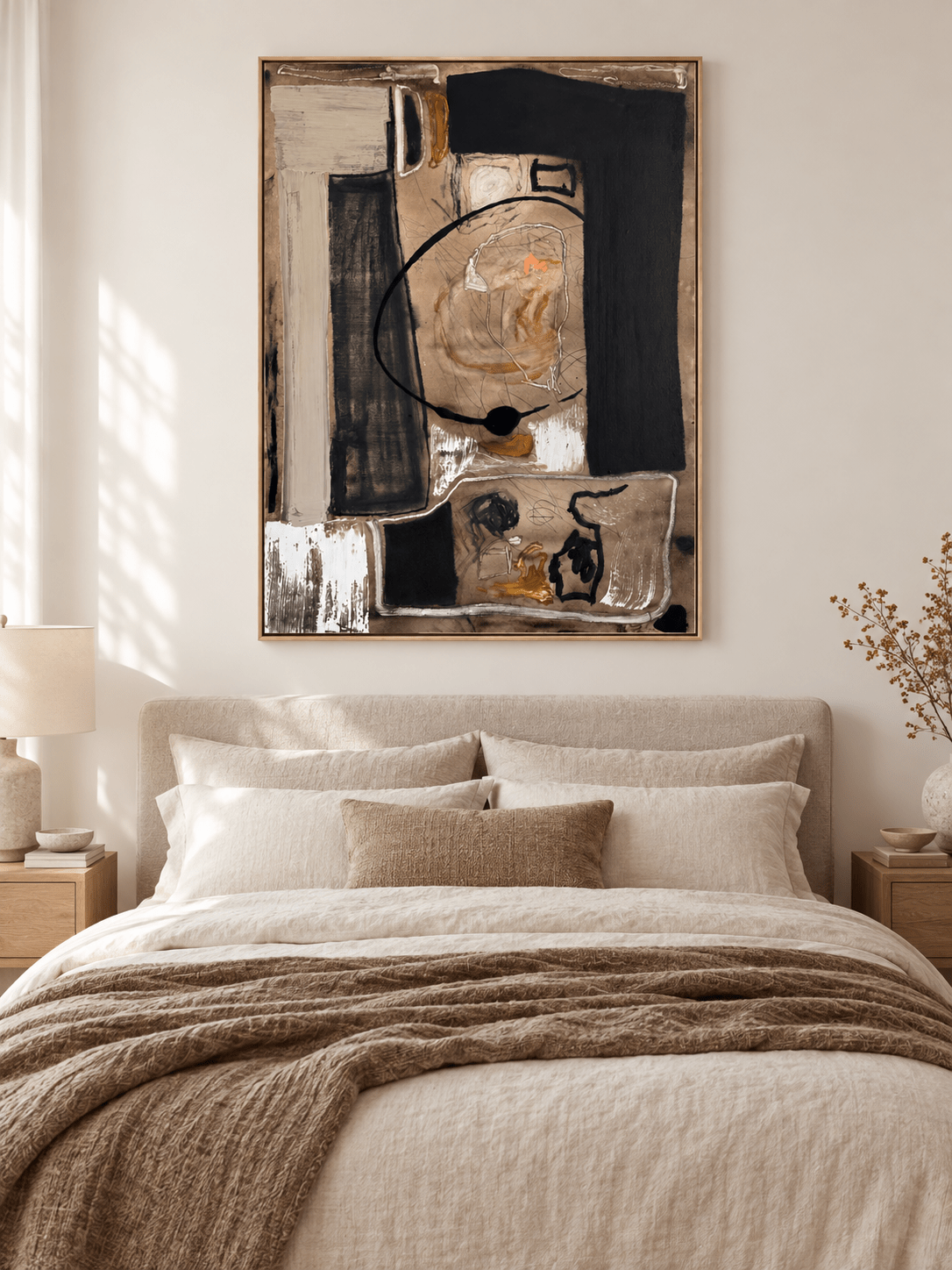 Neutral geometric abstract painting with bold black forms displayed above a bed in a modern bedroom
