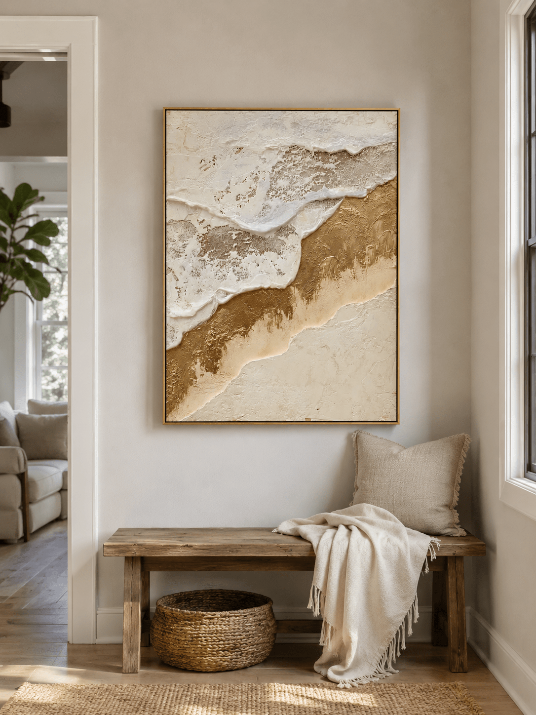 Vertical white and gold textured wall art displayed above a modern entryway console