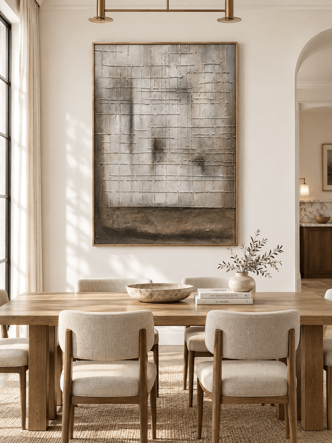 Hand-painted architectural abstract wall art displayed in a modern organic open-plan dining room