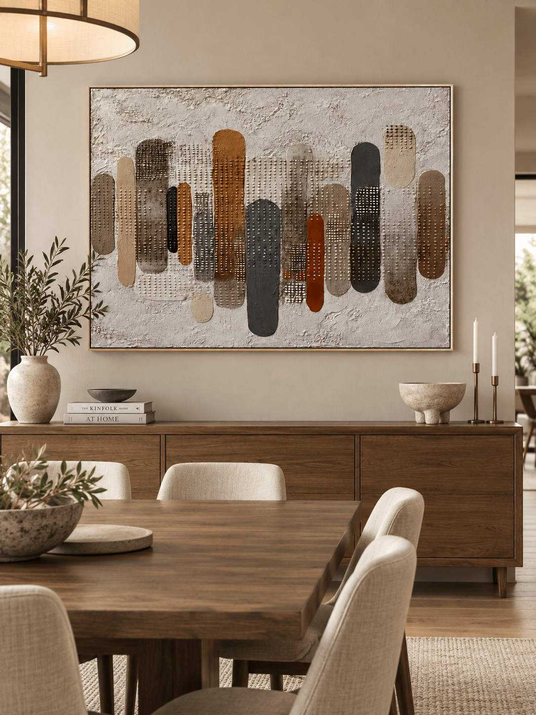 Hand-painted contemporary geometric wall art with rounded vertical shapes displayed in an open-plan dining room