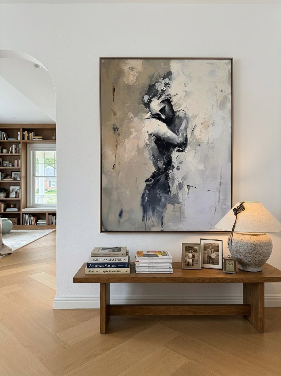 Hand-painted abstract figurative canvas painting featuring a solitary female figure in neutral beige, gray, and black tones with expressive textured brushstrokes for modern bedroom wall decor.