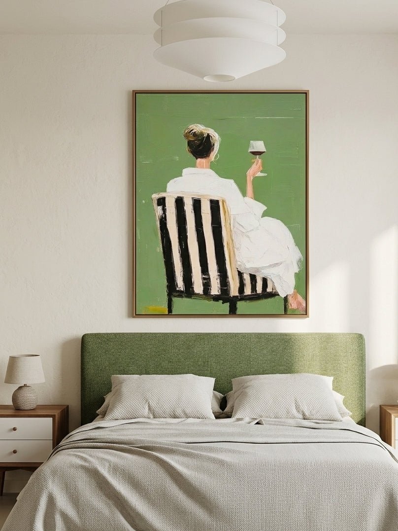 Hand painted modern feminine figurative wall art with woman holding wine glass on green background for contemporary bedroom decor