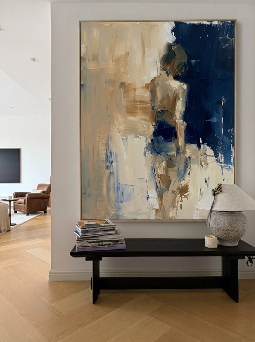Heavy texture hand-painted abstract female figure painting in navy blue and oatmeal beige by Eleanor Hayes for modern interior wall decor.