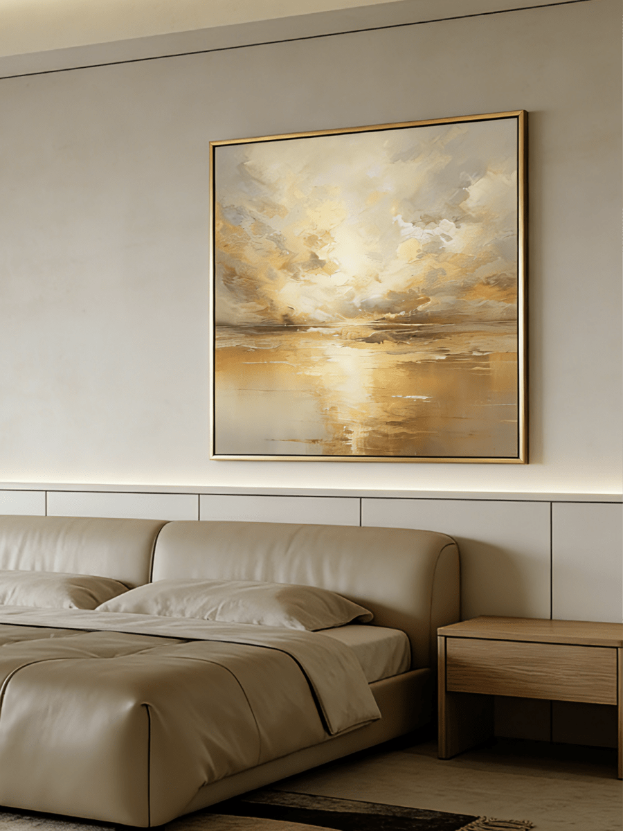 Large square hand-painted abstract seascape in gold and cream tones with shimmering water reflections by Evelyn Li in a high-end master bedroom.