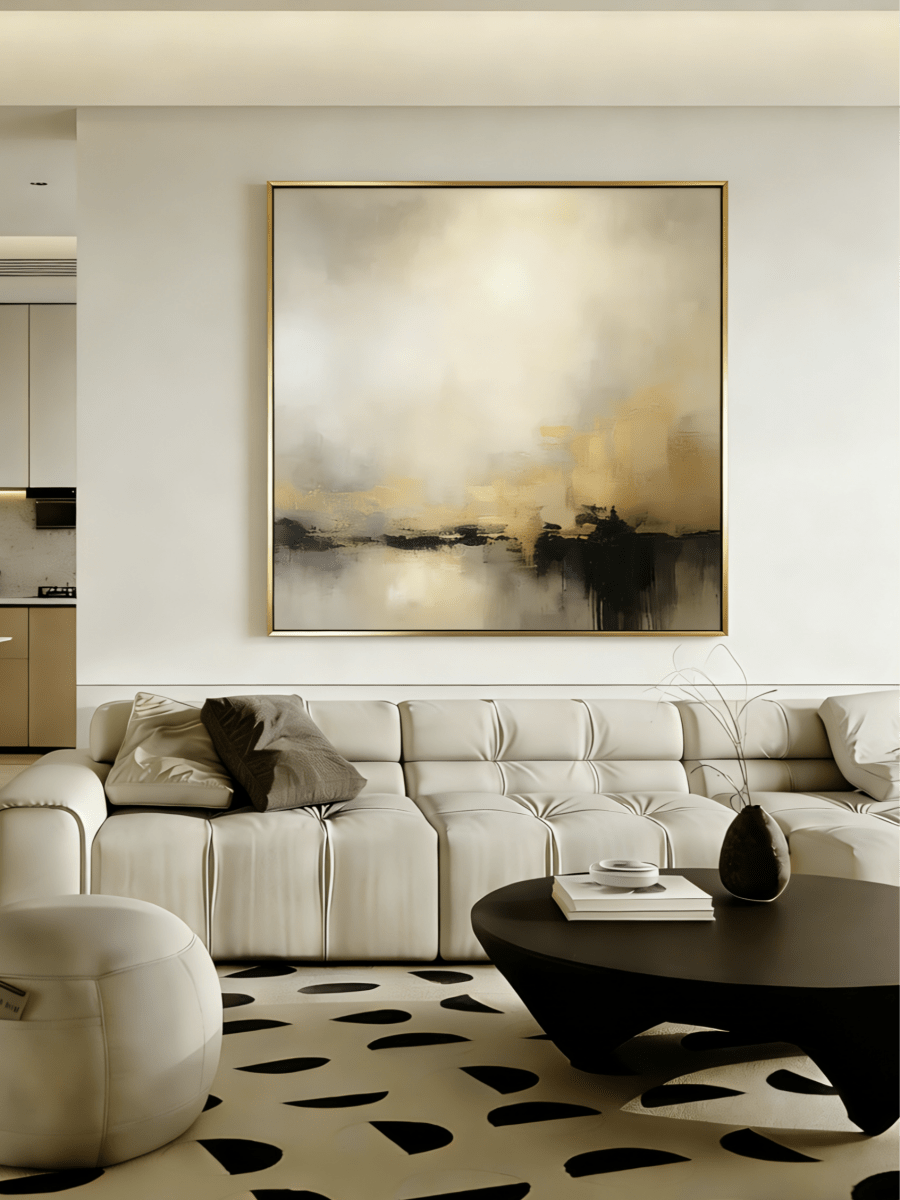 Large square hand-painted abstract painting with heavy 3D gold texture and black drip effect by Evelyn Li in a modern minimalist living room.