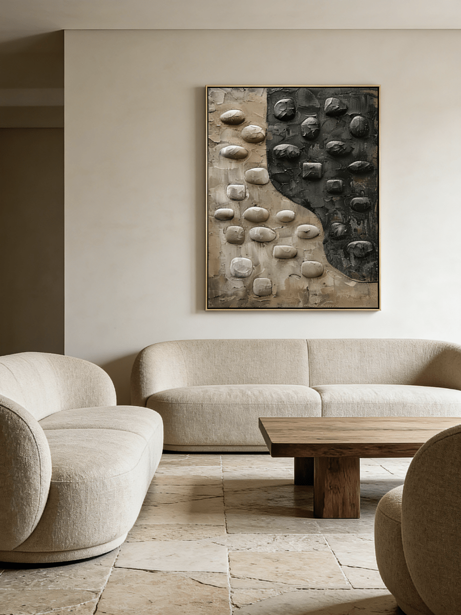 Hand-painted 3D relief oil painting by featuring raised black and beige stone textures on a large vertical canvas for modern home decor.