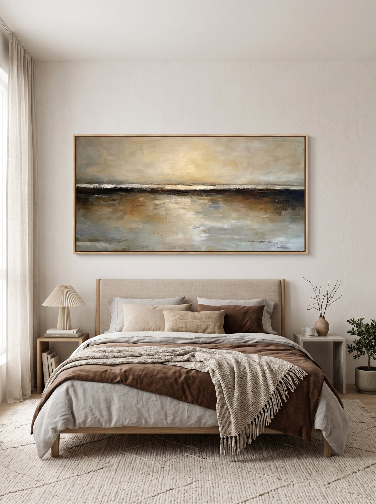 Muted gold and charcoal horizon canvas wall art by Evelyn Li hanging above bed in warm neutral bedroom