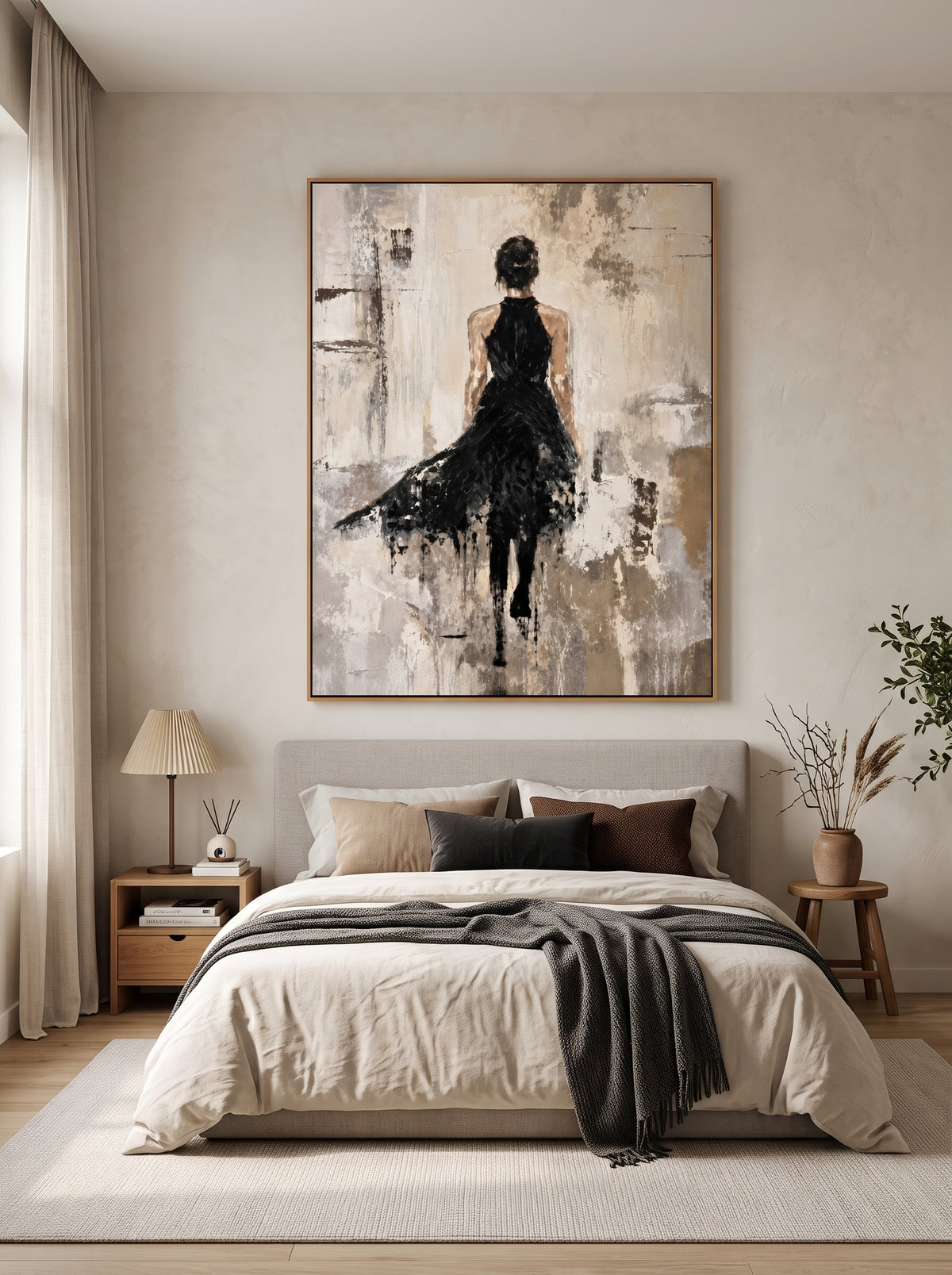 Textured female figure wall art with a black dress displayed in an elegant neutral modern bedroom.
