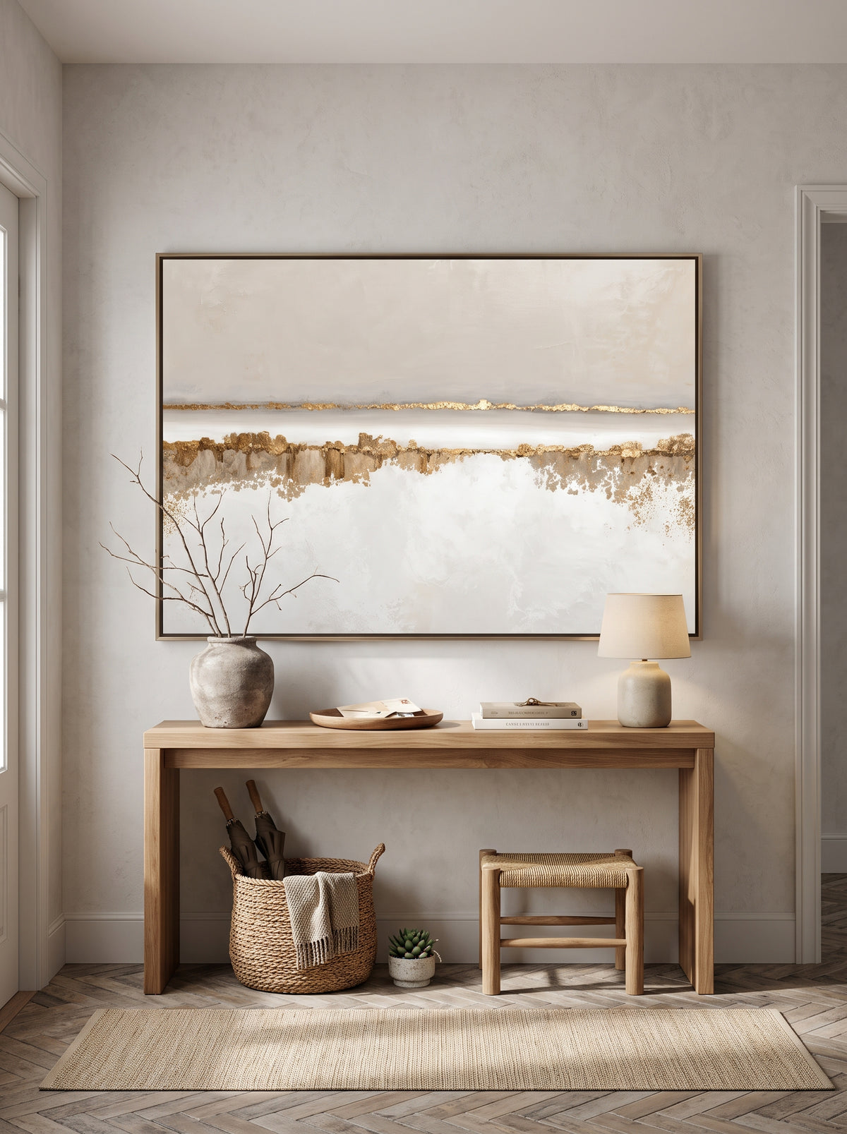 Warm ivory and metallic gold horizontal canvas painting mounted above console table in Japandi entryway