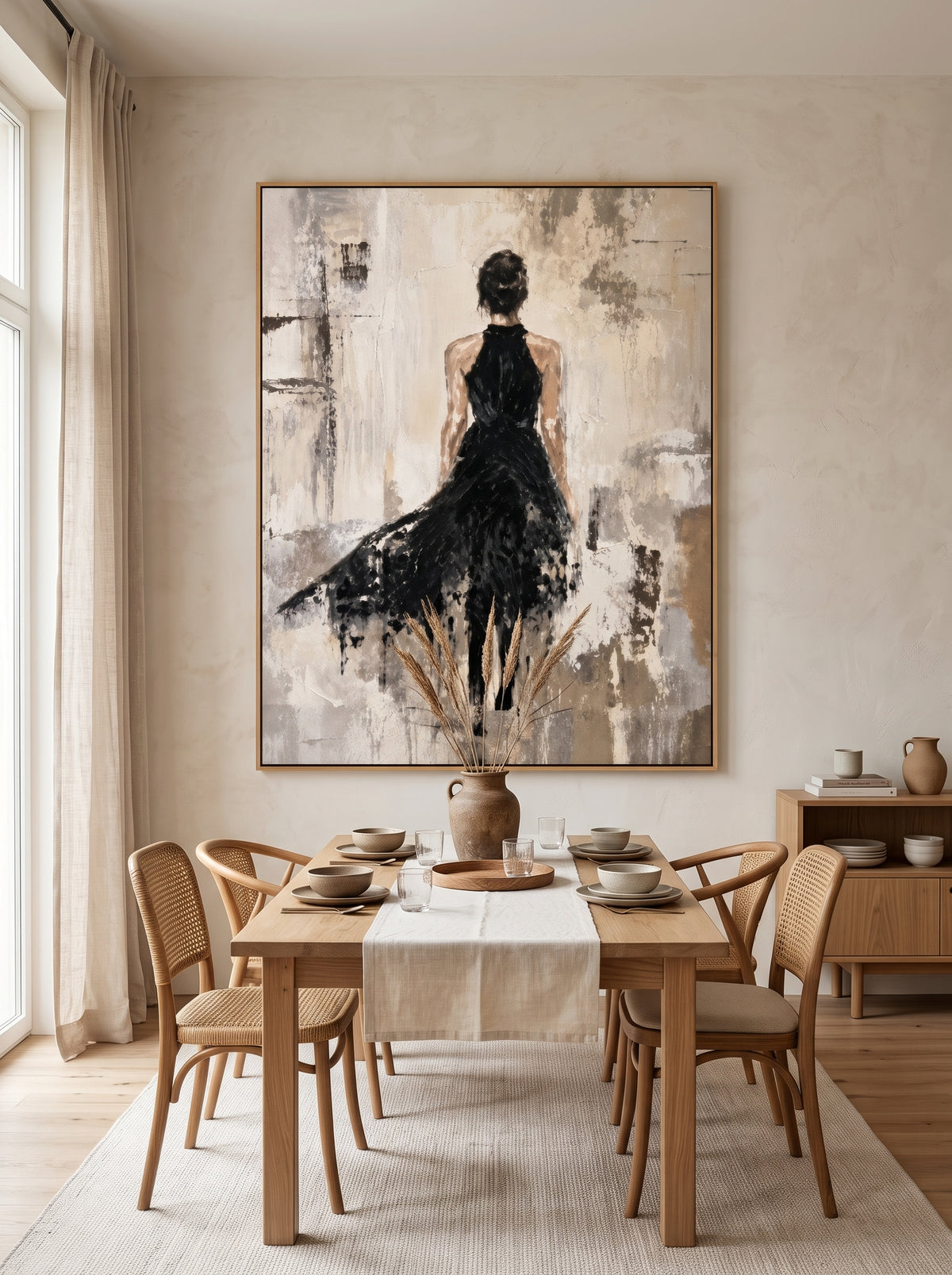 Hand-painted abstract woman in black wall art displayed in a contemporary open dining room with neutral decor.