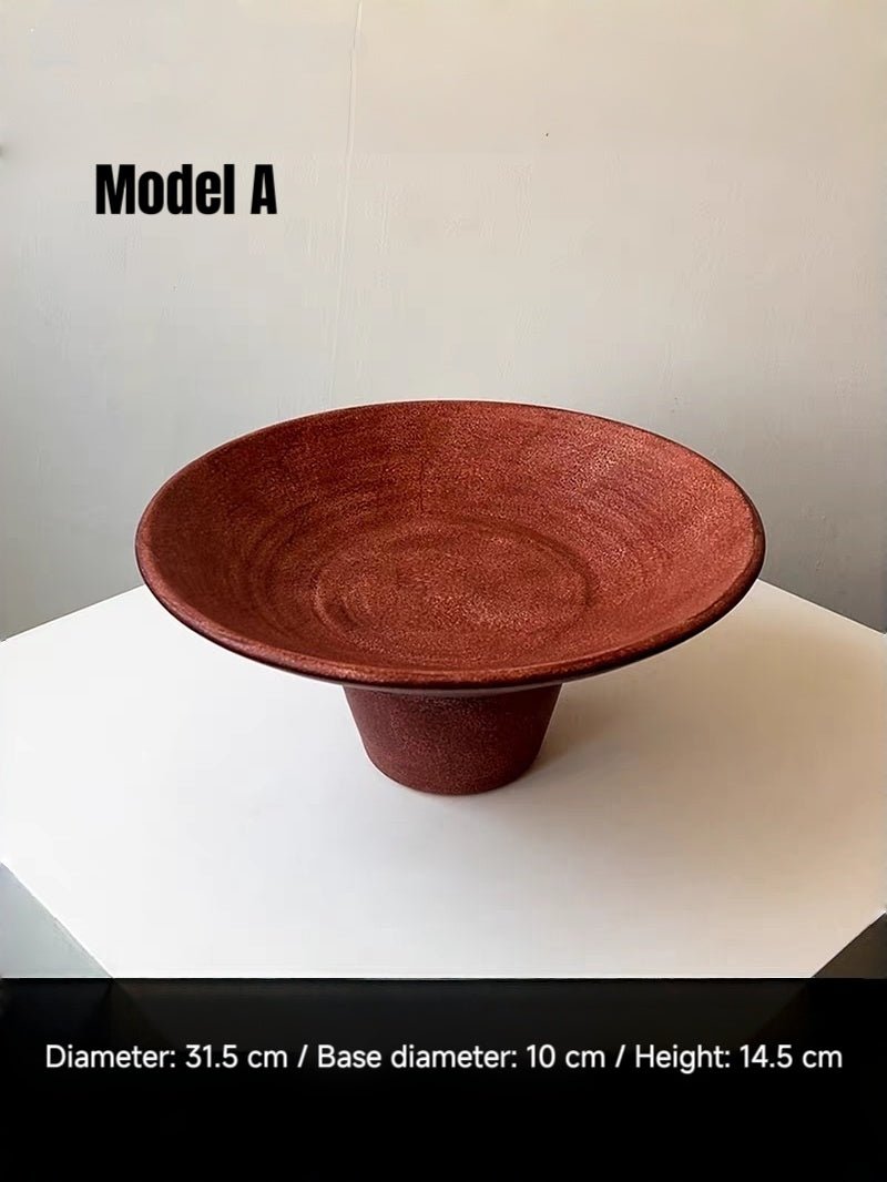 artisan ceramic geometric sculptures in matte rust red and black, modern minimalist architectural home decor on a white background.