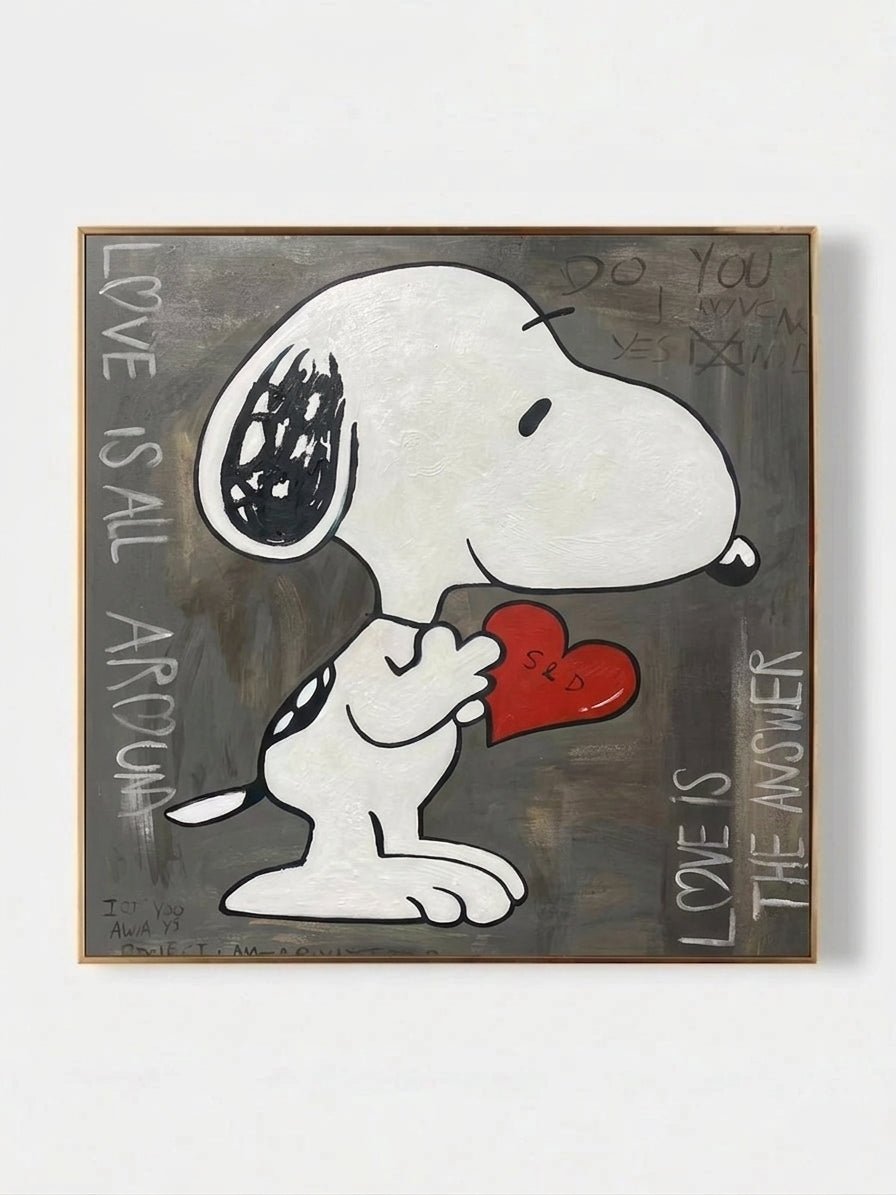 graffiti painting featuring a cartoon dog holding a red heart with "Love is the Answer" text on a textured gray background.