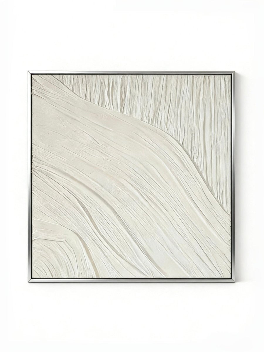 Close-up of the hand-painted white textured wall art featuring heavy impasto flowing lines in a silver floater frame
