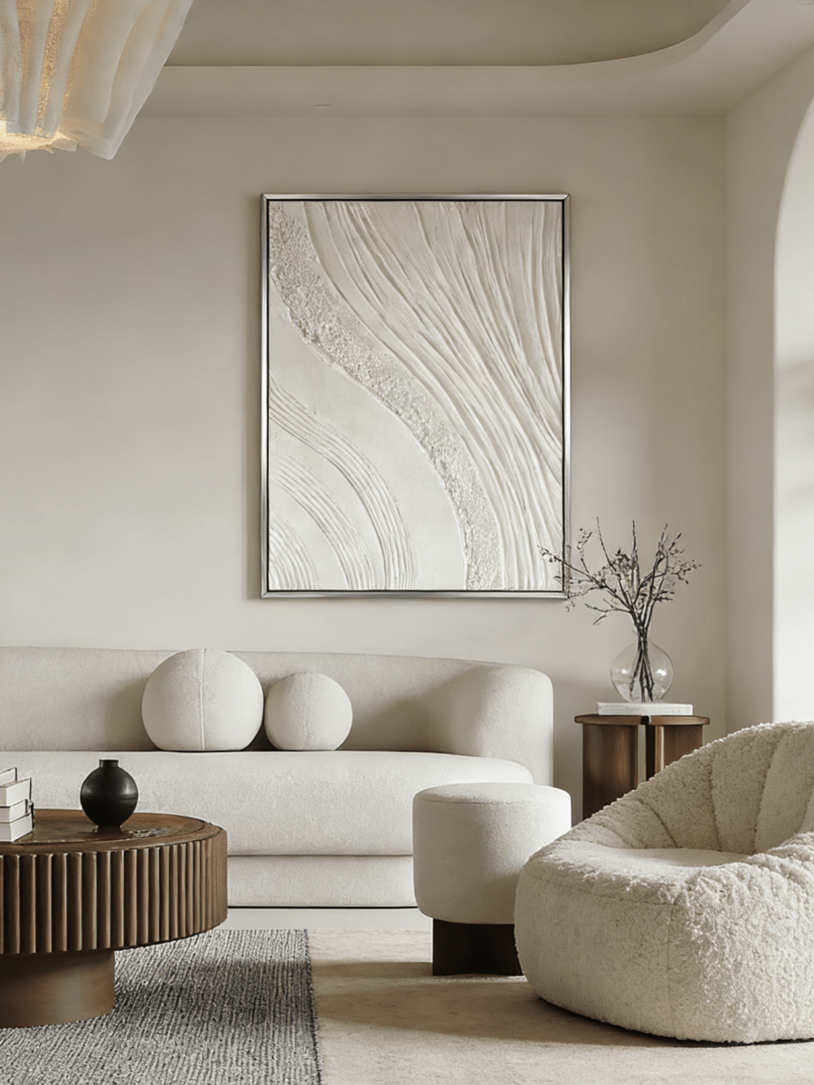 Close-up of the hand-painted white textured wall art featuring heavy impasto waves and mineral textures in a modern silver floater frame.