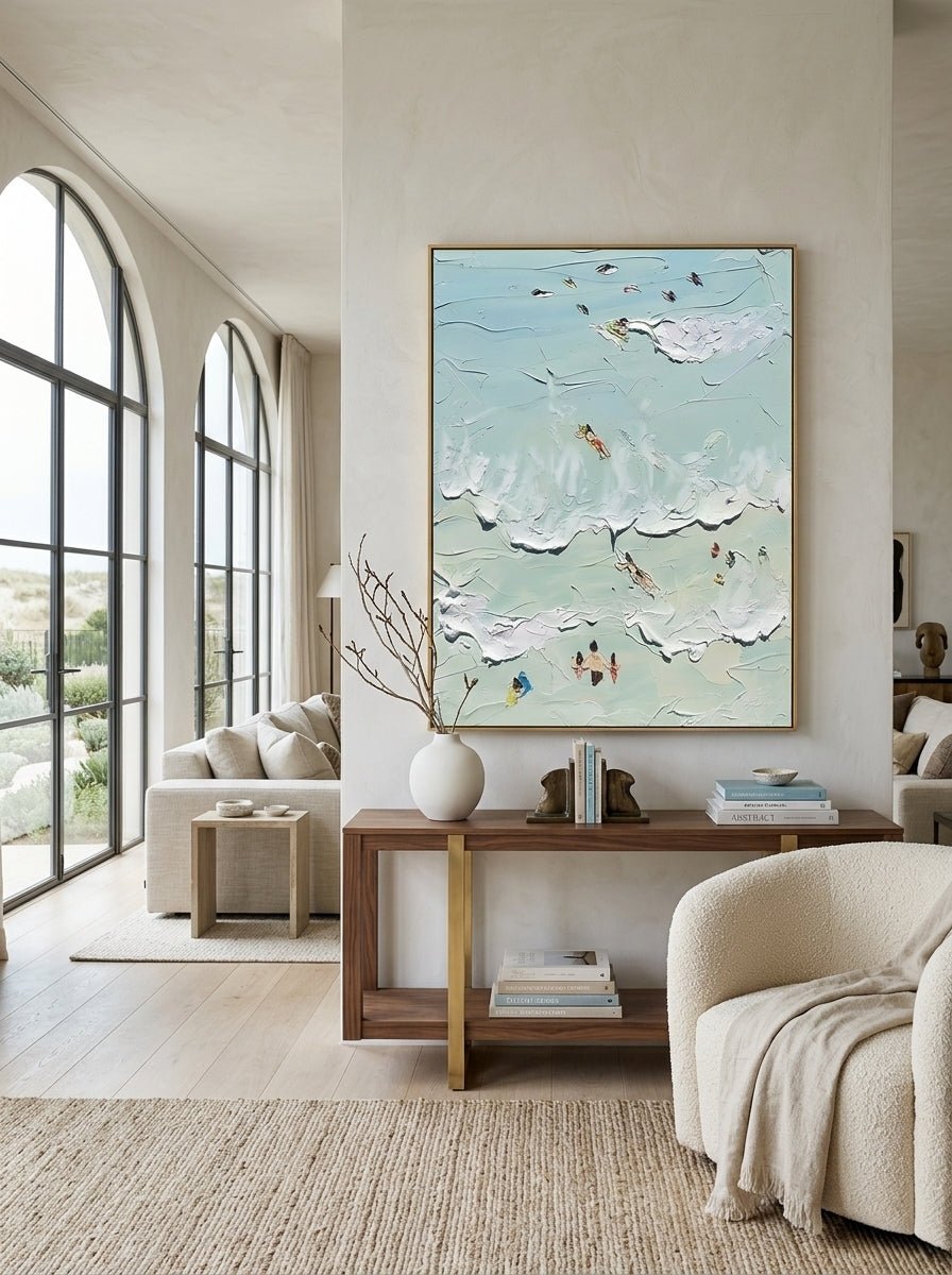 Hand-painted textured coastal surf wave wall art featuring ocean waves and surfers in soft aqua tones on canvas