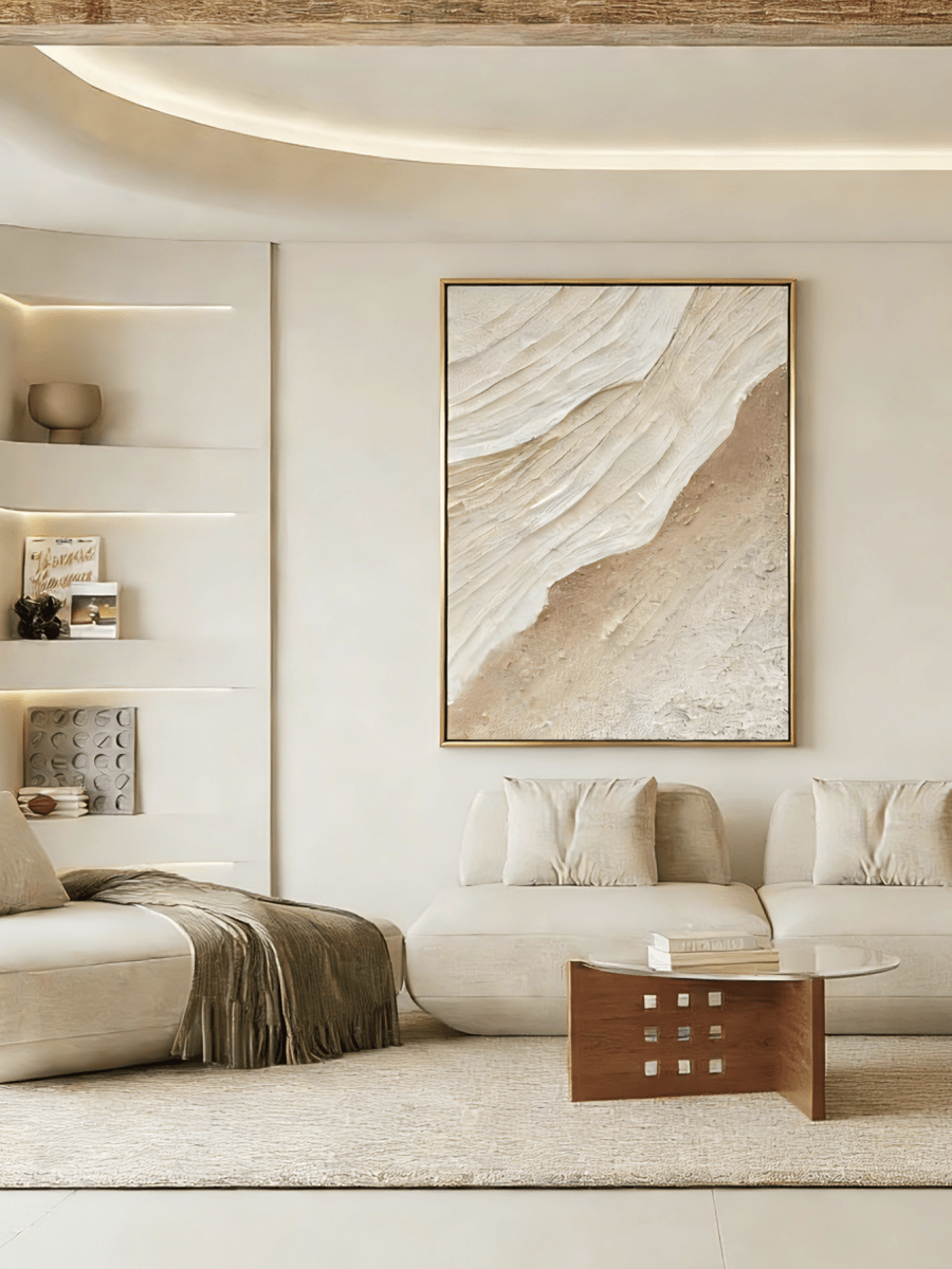 Large vertical 3D textured abstract painting with heavy sand-colored impasto ridges in a modern minimalist living room.