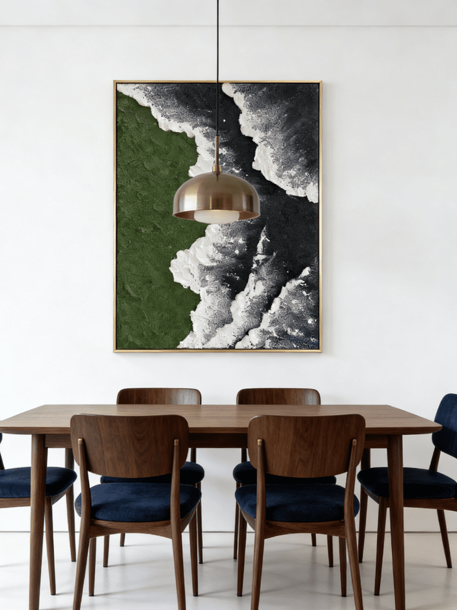 Close-up of a hand-painted 3D textured abstract painting featuring heavy white sculpted foam over moss green and black backgrounds in a gold frame.