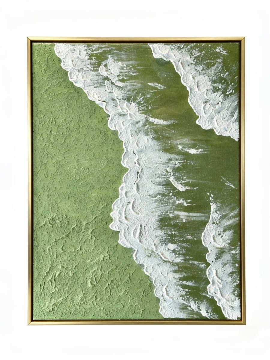 High-relief 3D textured painting showing white sculpted seafoam splashing over a deep forest green background in a gold frame.