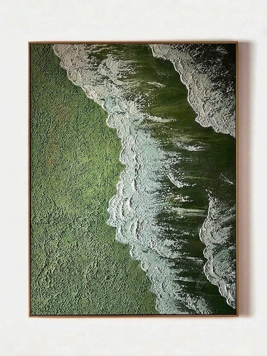 High-relief 3D textured painting showing white sculpted seafoam splashing over a deep forest green background in a gold frame.