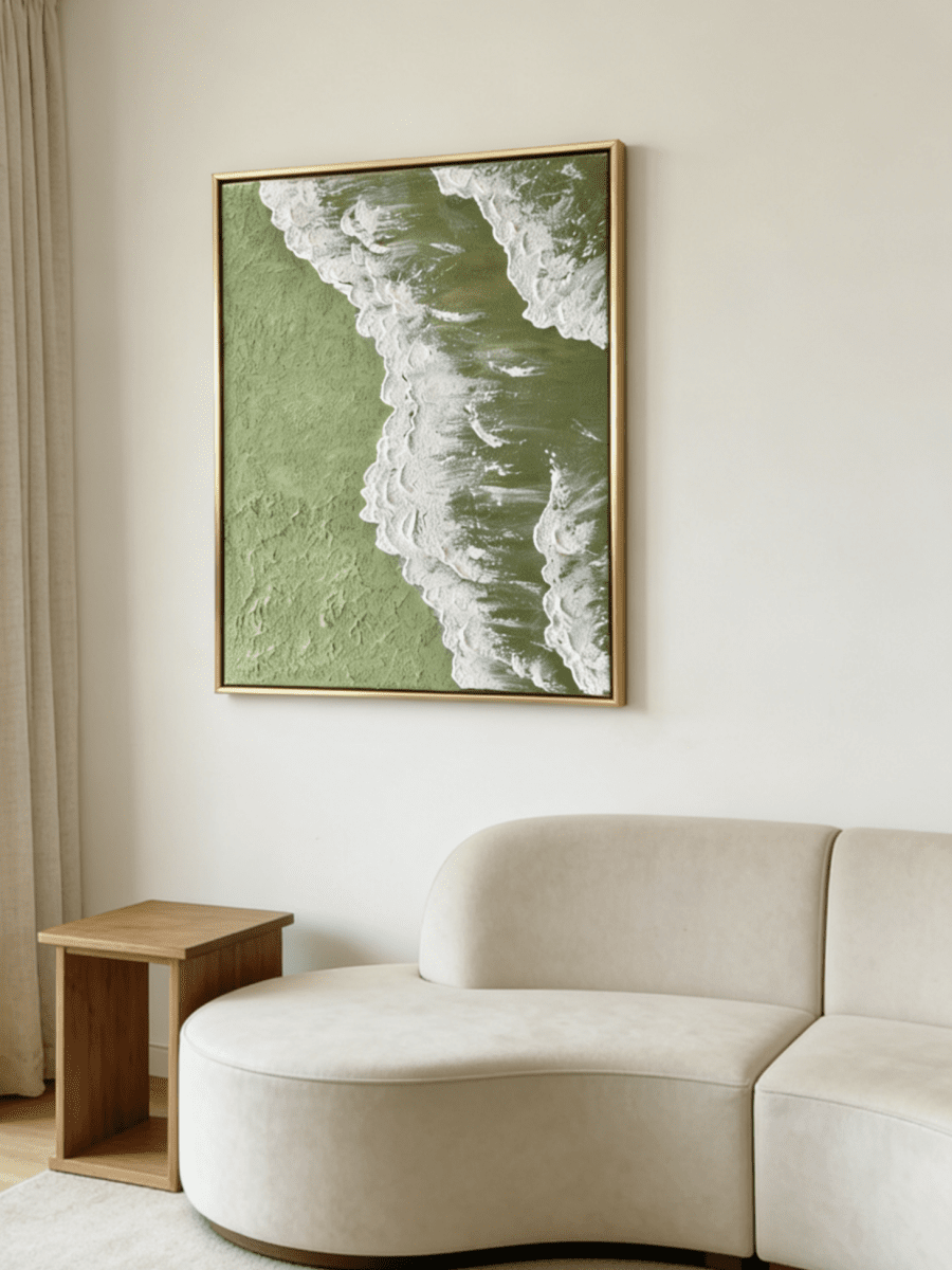 High-relief 3D textured painting showing white sculpted seafoam splashing over a deep forest green background in a gold frame.