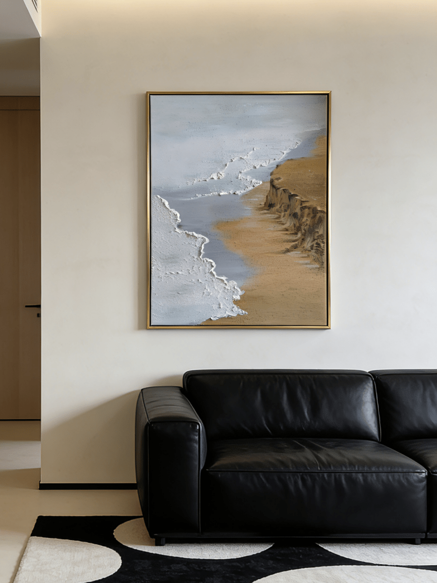 Large vertical hand-painted ocean seascape painting with heavy impasto white foam waves and golden cliffs by Leo Liang in a modern living room.