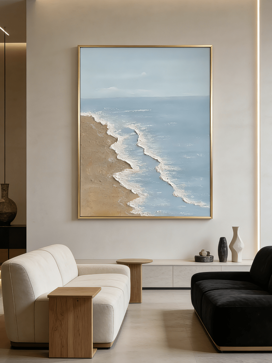 Large vertical hand-painted blue ocean painting with 3D textured white foam waves and sandy beach by Leo Liang in a bright modern bedroom.