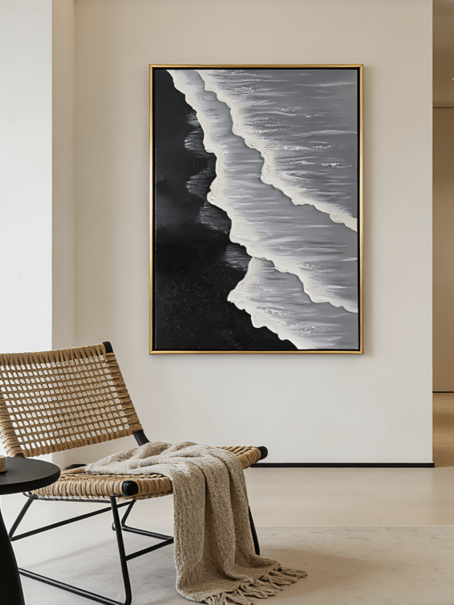 Large vertical hand-painted black sand beach seascape with heavy 3D textured white waves and grey ocean by Leo Liang in a modern living room.