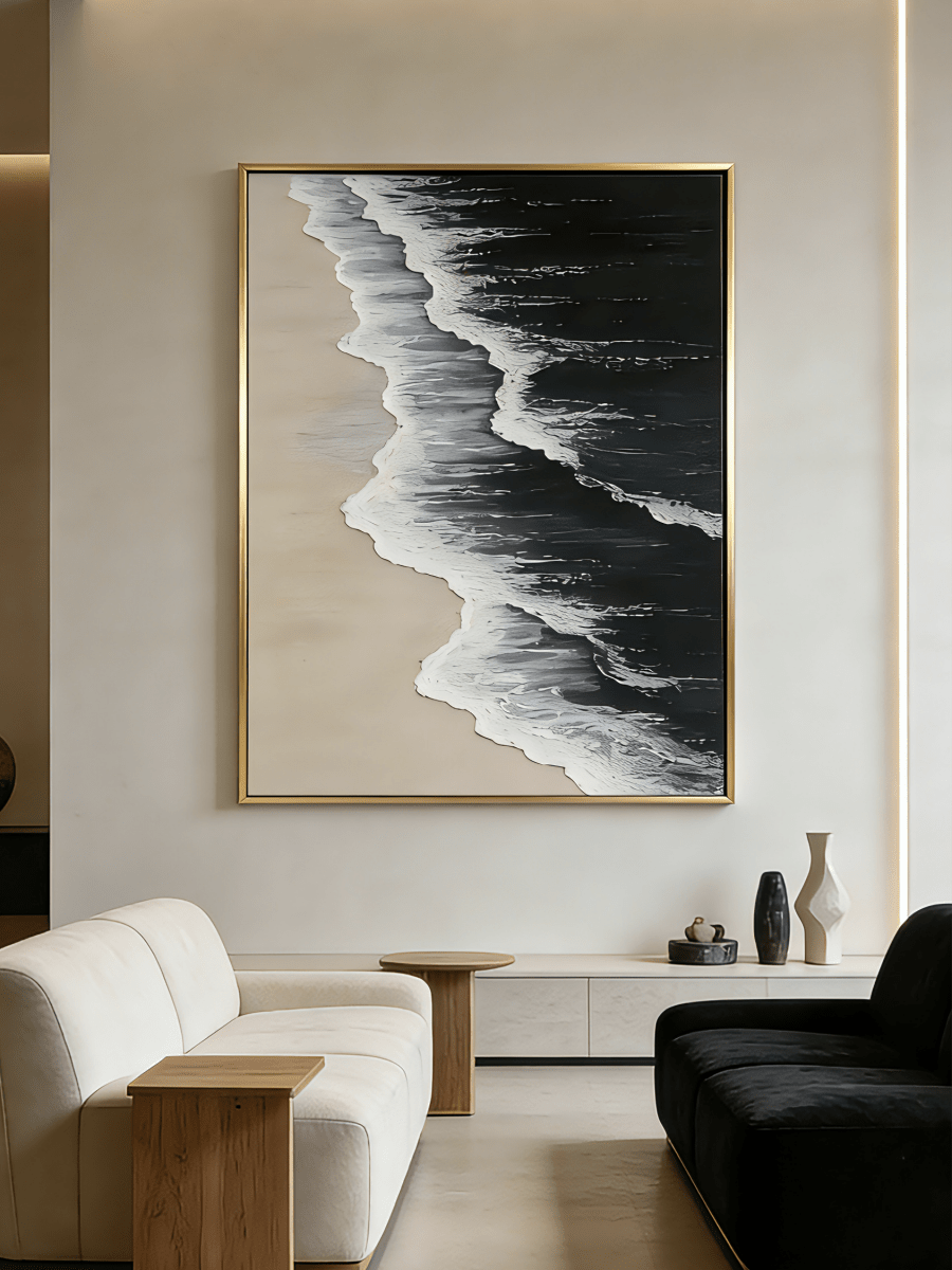 Large vertical hand-painted black ocean painting with heavy 3D white foam texture and beige sand by Leo Liang in a modern minimalist interior.