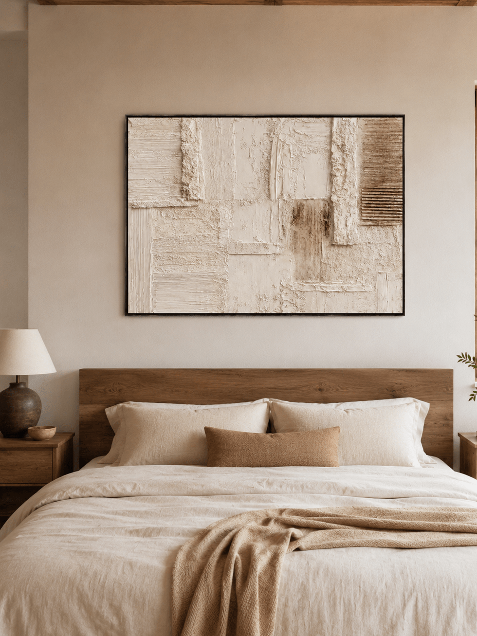 Wabi-Sabi beige textured wall art displayed above the bed in a warm minimalist bedroom