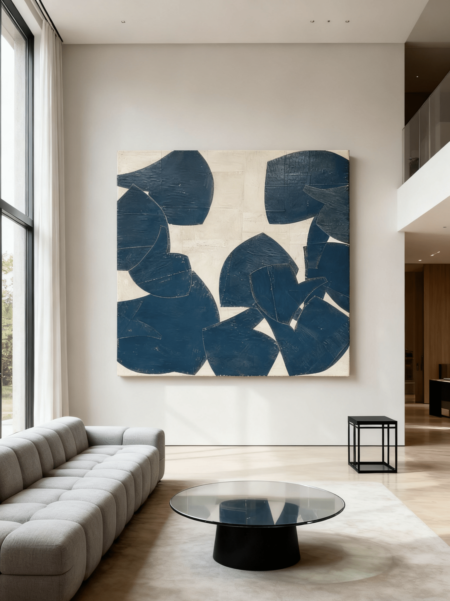 Minimalist geometric painting hanging above a mid-century modern sofa in a living room.