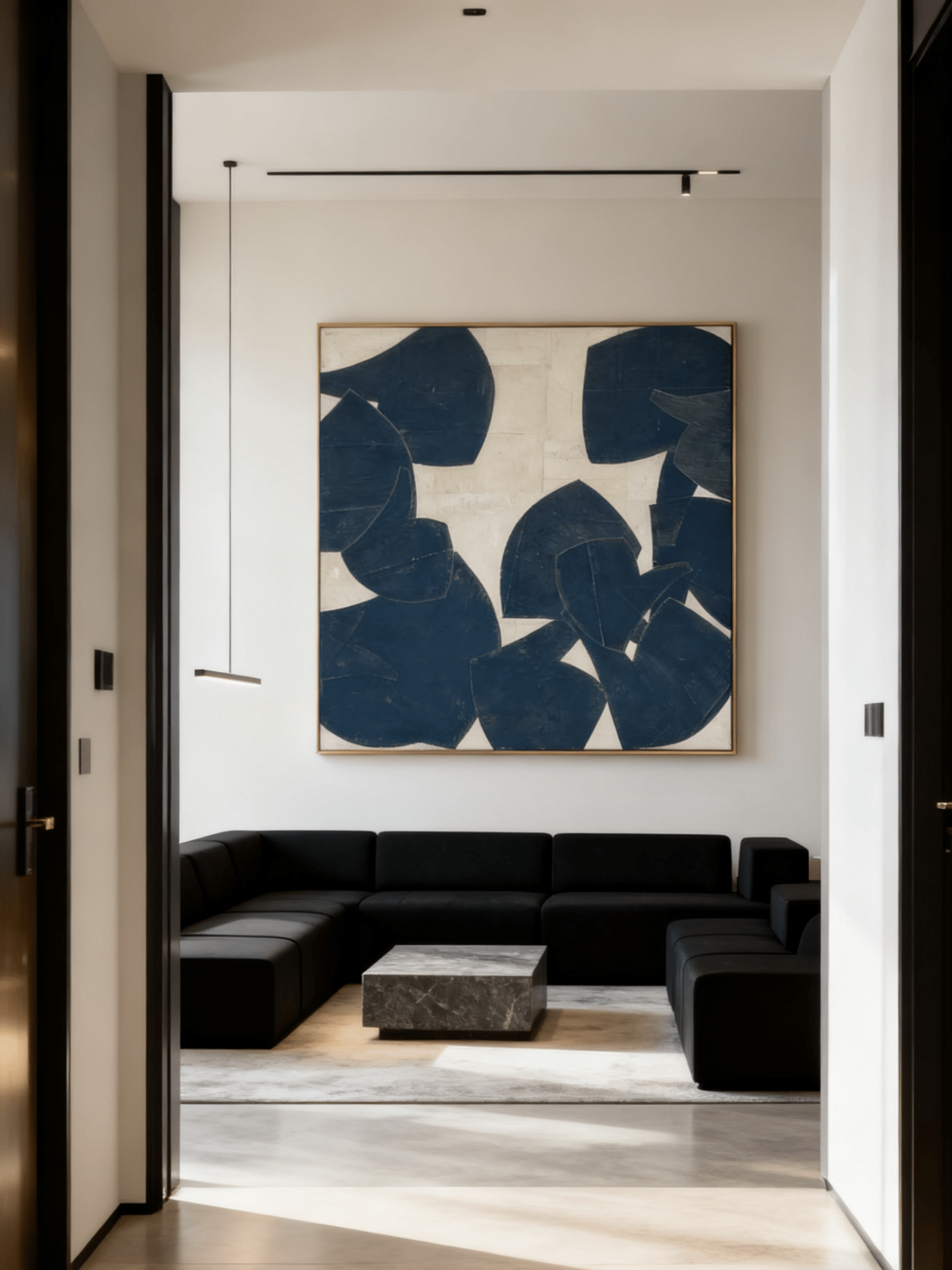Minimalist geometric painting hanging above a mid-century modern sofa in a living room.