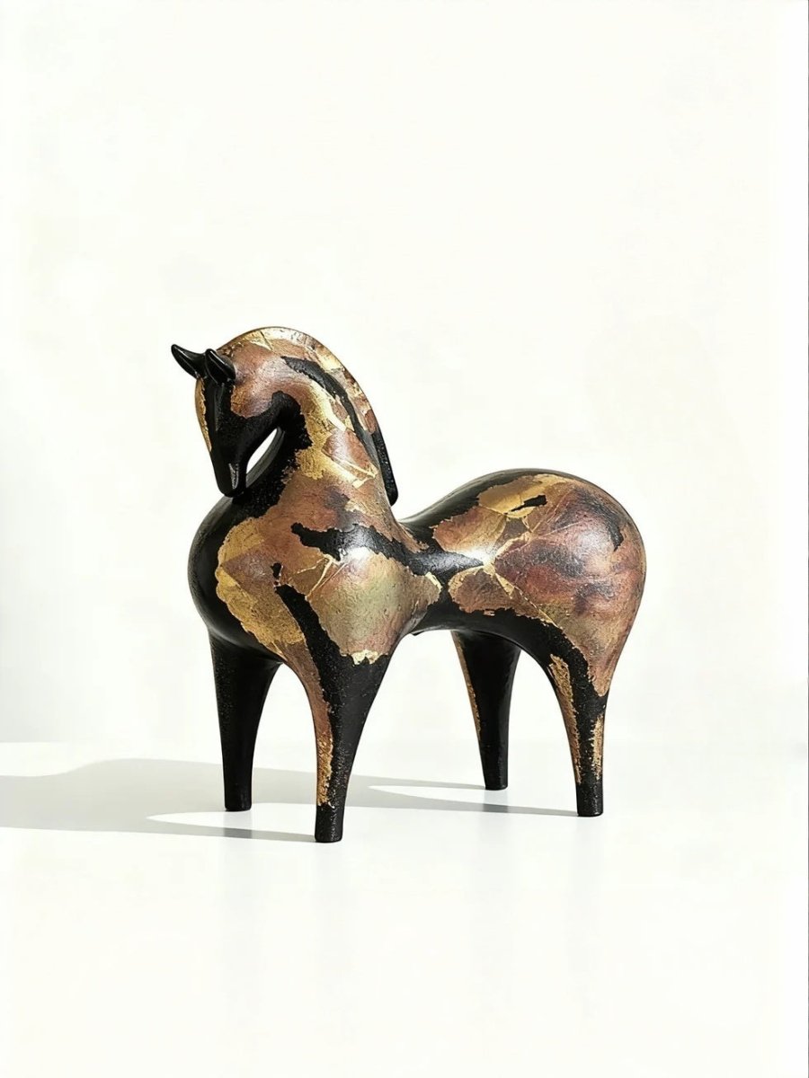 abstract horse sculpture with antique gold leaf finish on black resin, modern equestrian art for luxury home decor.