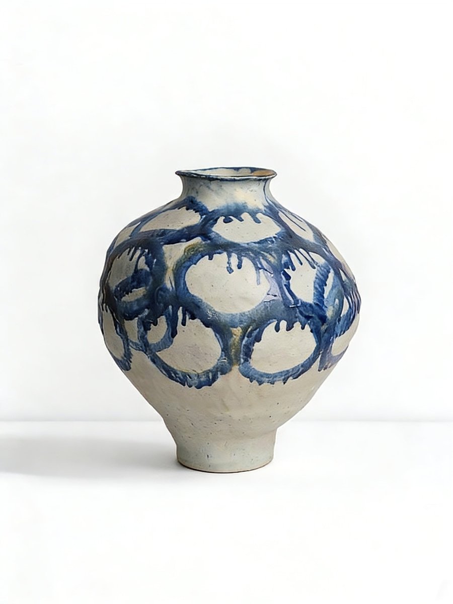 blue and white abstract drip glaze ceramic vase, hand-painted ink-wash style pottery sculpture for modern living room console.