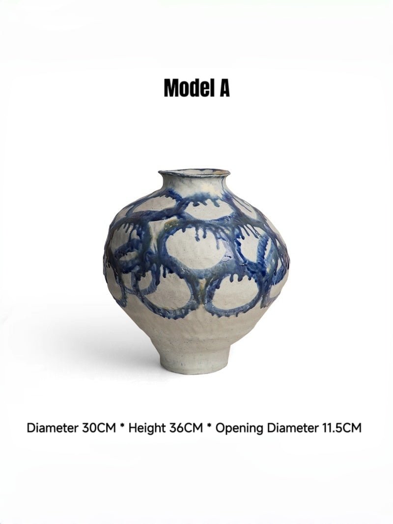 blue and white abstract drip glaze ceramic vase, hand-painted ink-wash style pottery sculpture for modern living room console.